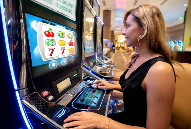 Jurassic Kingdom slot game interface on dewa1000 agen showing dinosaur symbols and reel layout